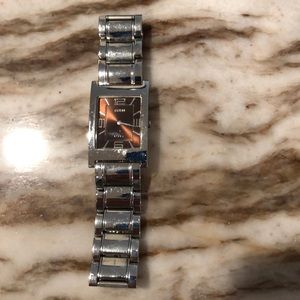 Guess watch brown face and needs battery